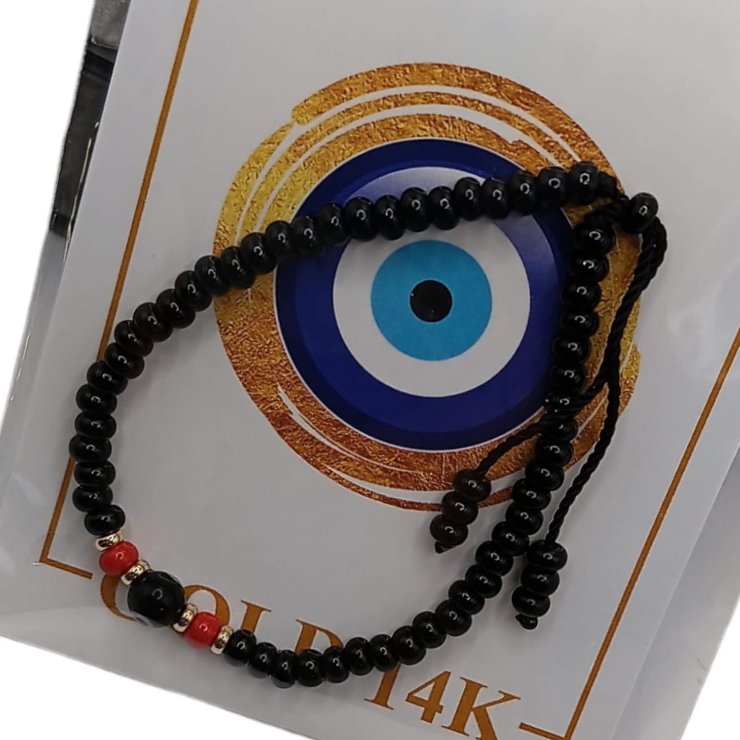 PULSERA HILO AJUSTABLE COLOR NEGRO CON OJITO ORO 14K