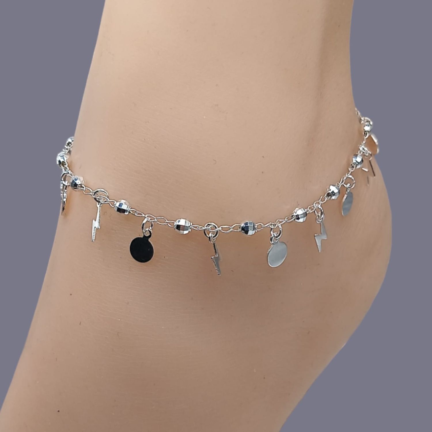 Tobillera rayos y circulos. 9.5&quot; de largo. TPLATA .925