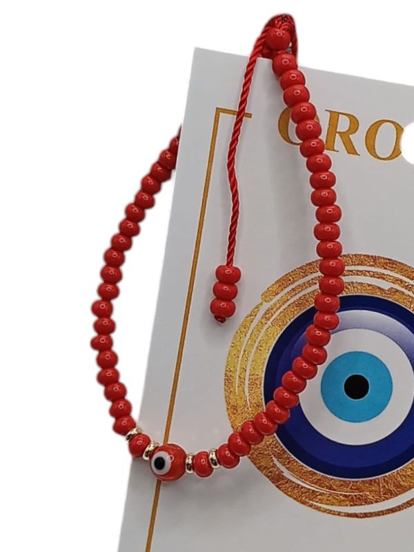 PULSERA HILO OJITO ROJO ORO 14K