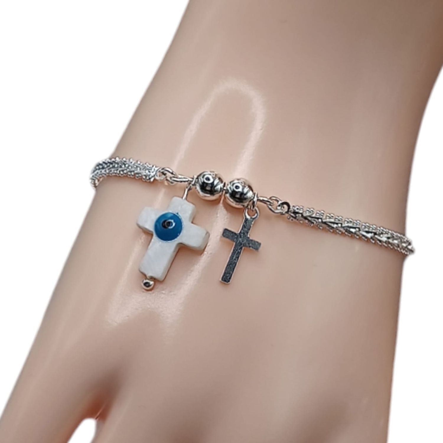 Pulsera boleada con cruces y ojito 7.5&quot; PLATA .925