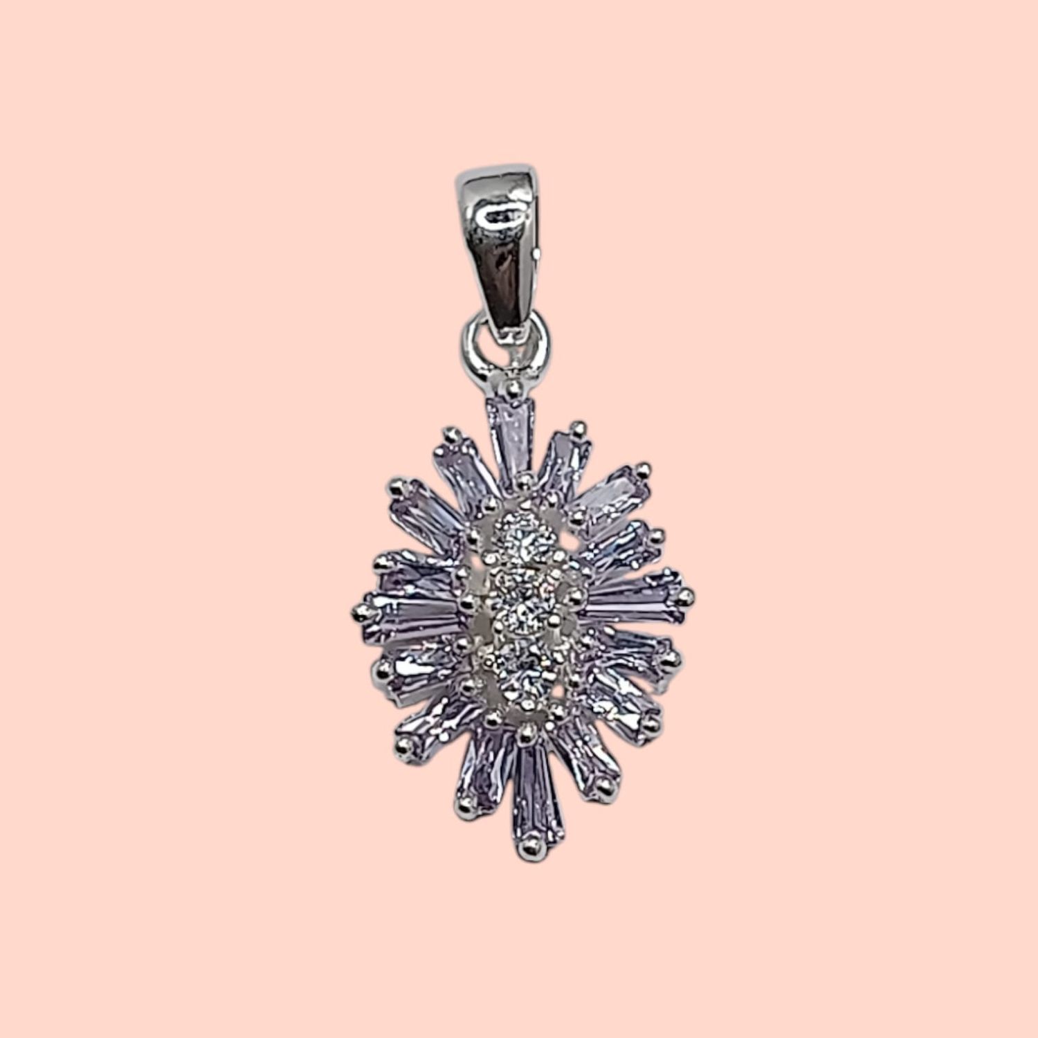 Dije concirconias baguette. 2cm. de largo. PLATA .925
