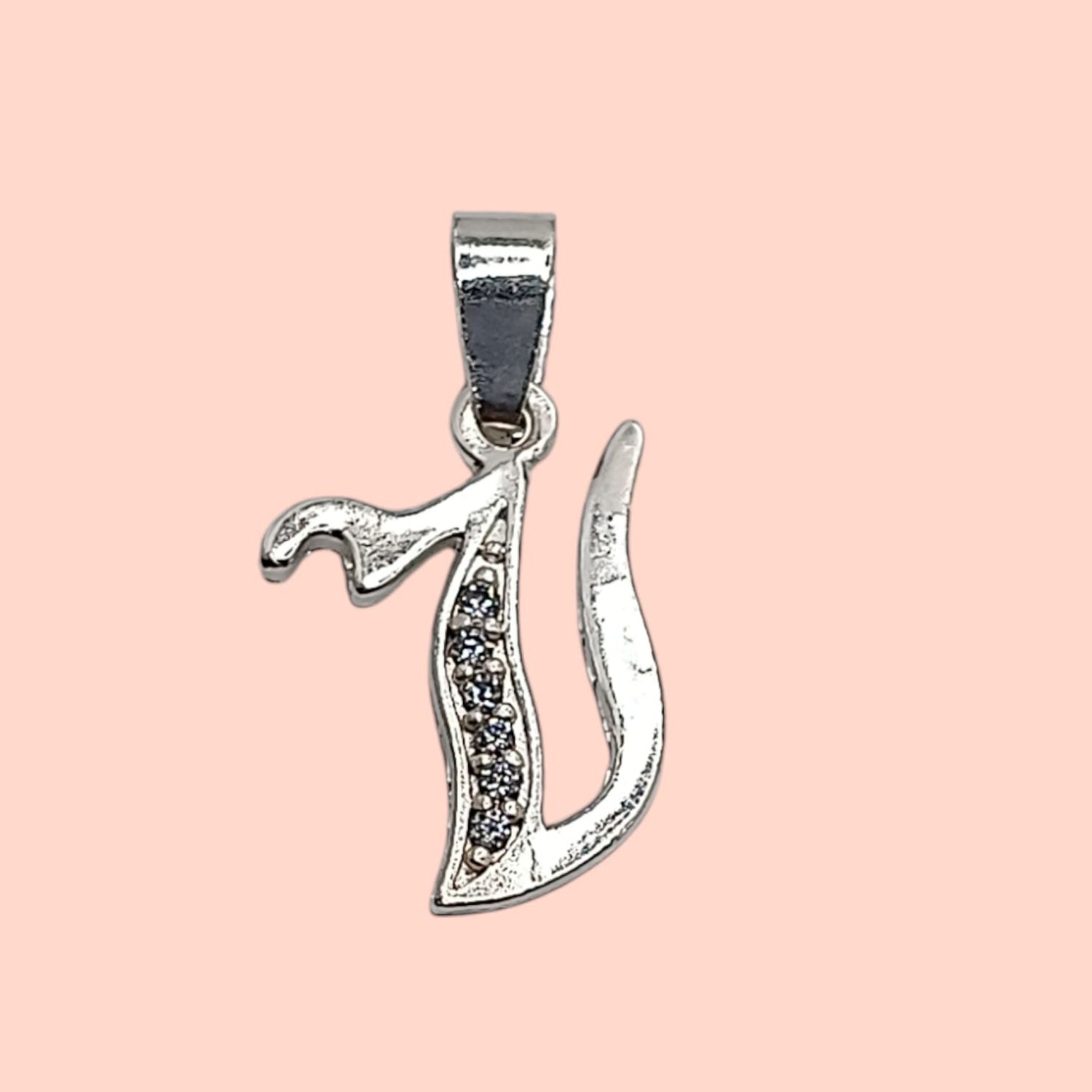 Dije letra V con circonias. 2 cm. de largo. PLATA .925