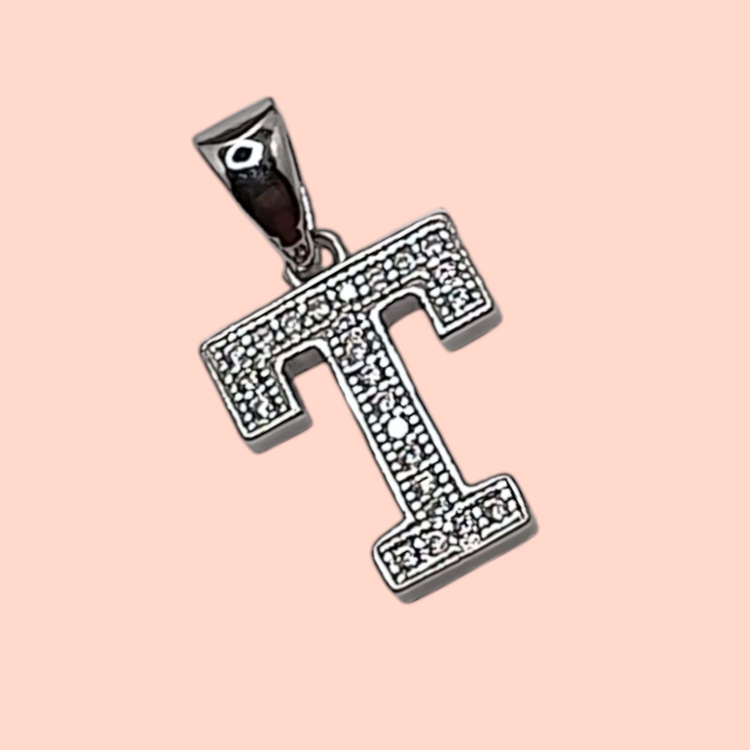 DIJE LETRA T 1.5 CM PLATA RODISADA  CON MICROPAVE PLATA .925