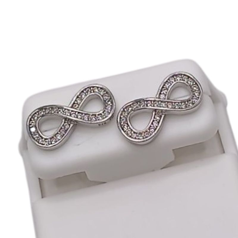 ARETE FANCY INFINITO BROCHE MARIPOSA, PLATA .925