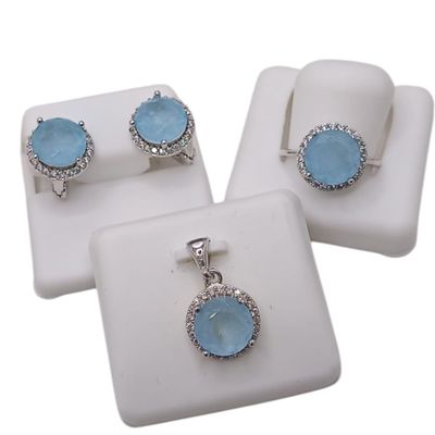 JUEGO ARETES, DIJE Y ANILLO #6 CZ AZUL CIELO REDONDA, PLATA .925