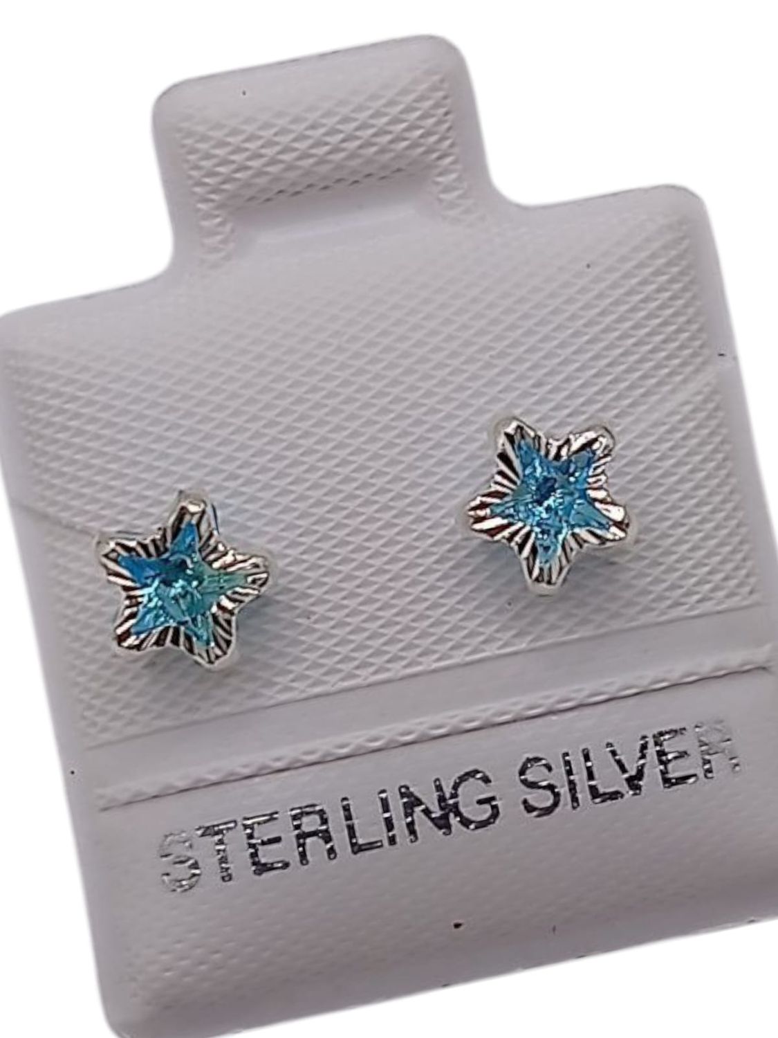 BROQUEL ESTRELLA BISEL DIAMANTADO CZ AZUL, PLATA .925