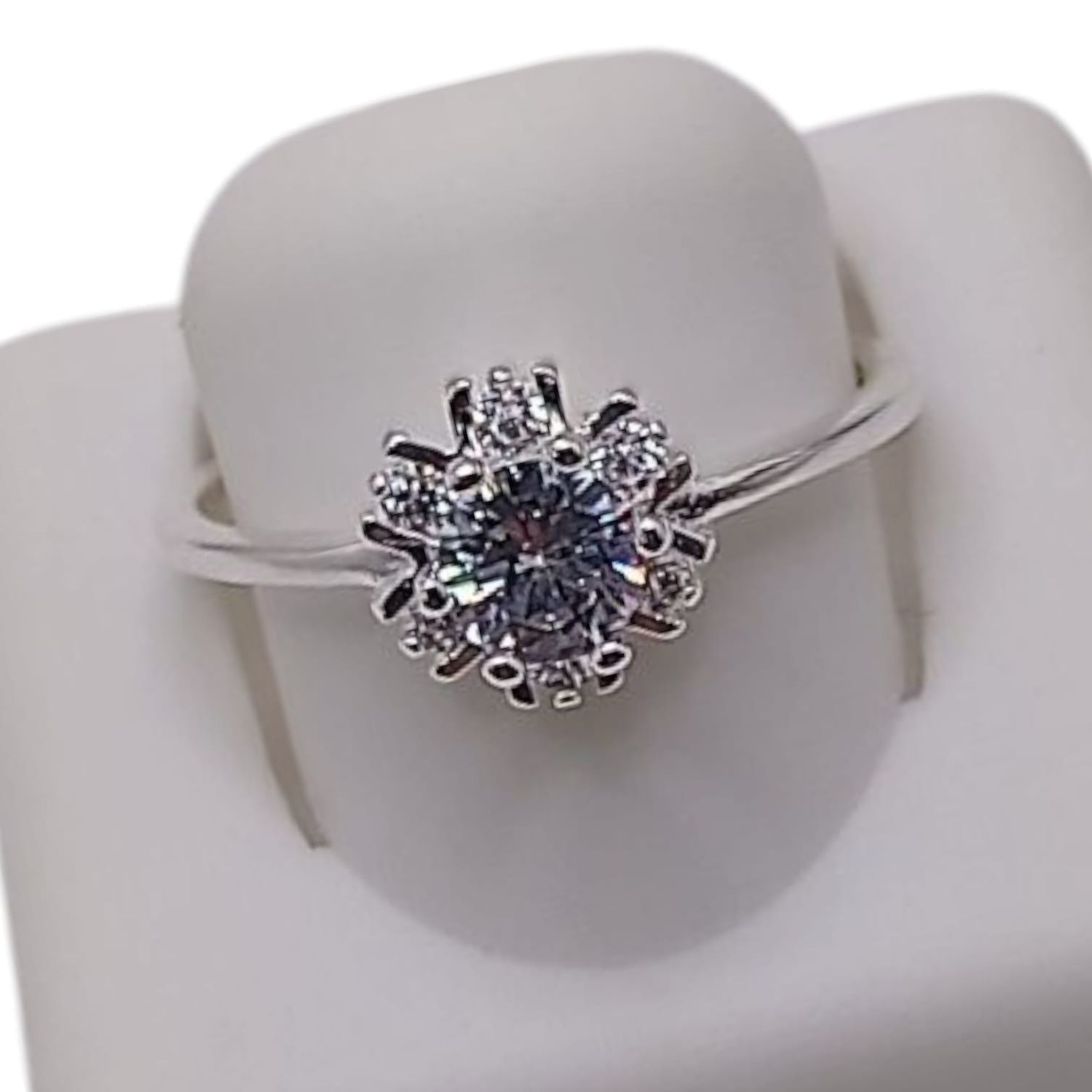 ANILLO SOLITARIO FLOR BAGUET PLATA .925