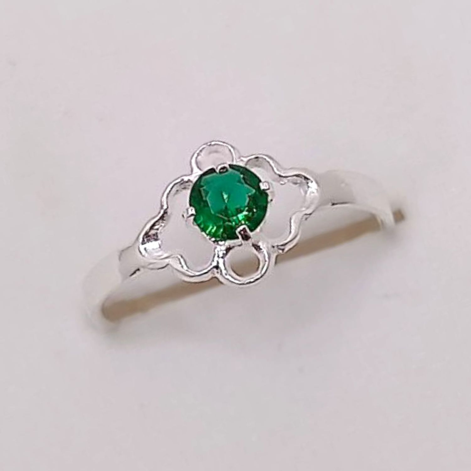 ANILLO NIÑA FLOR CZ VERDE, PLATA .925