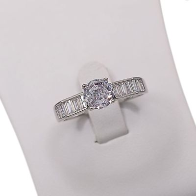 ANILLO FANCY SOLITARIO CON BAGUETT VARIAS MEDIDAS PLATA .925