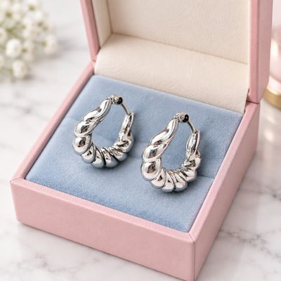 Arracada torsal, 2.5 cm. de diametro PLATA .925