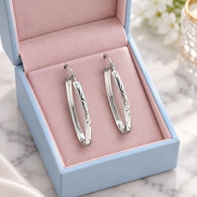 ARRACADA DIAMANTADA OVALADA 4 CM PLATA .925