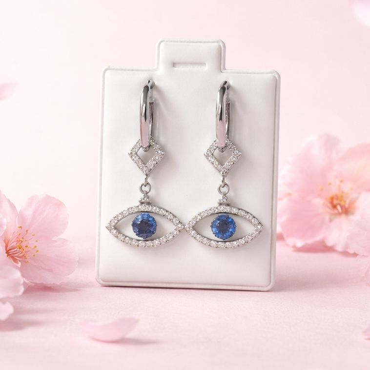 HUGGUI RODISADO CON OJO DE  DIOS 2.7 CM DE LARGO PLATA .925