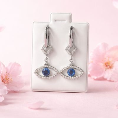 HUGGUI RODISADO CON OJO DE  DIOS 2.7 CM DE LARGO PLATA .925