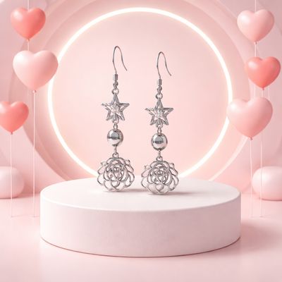 ARETE LARGO 4.5 CM ESTRELLA Y FLOR RODIO PLATA .925