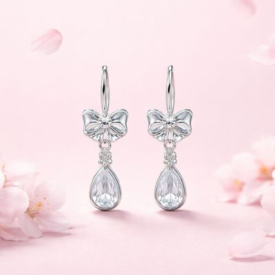 ARETE DE MOÑO CON CORAZON CZ BLANCA 2.5 CM PLATA .925