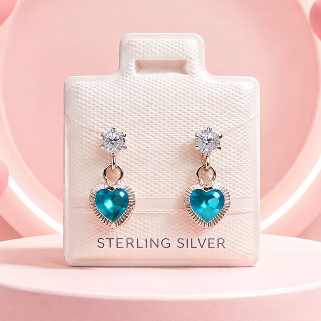 BROQUEL COLGANTE CORAZON CZ AZUL CIELO, PLATA .925