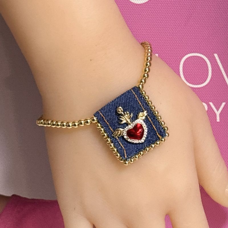 Pulsera Escapulario Ajustable con Corazon Alas Acero inoxidable