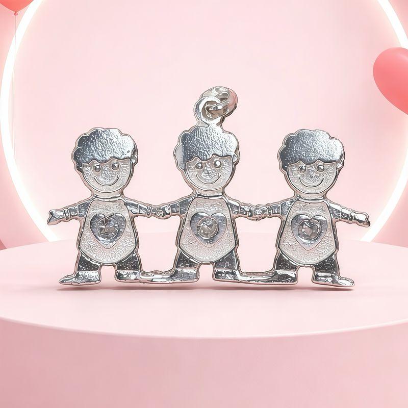 Dije 3 Ninos, mide 3.5CM  Plata 925 Mexicana.