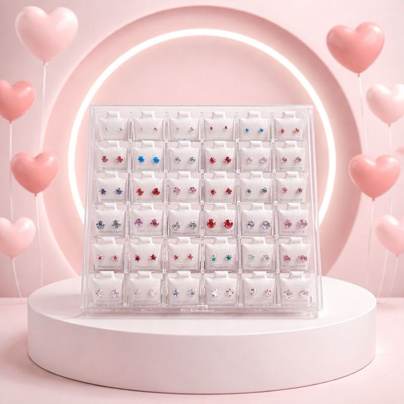 Caja acrílica con tapadera contiene 36 pares de broken en plata nueve 25 mexicano con broche de bolita atrás