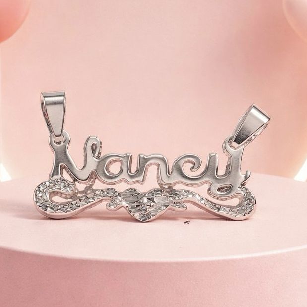 Nombre "NANCY" mide 3.5cm Plata 925 Mexicana.