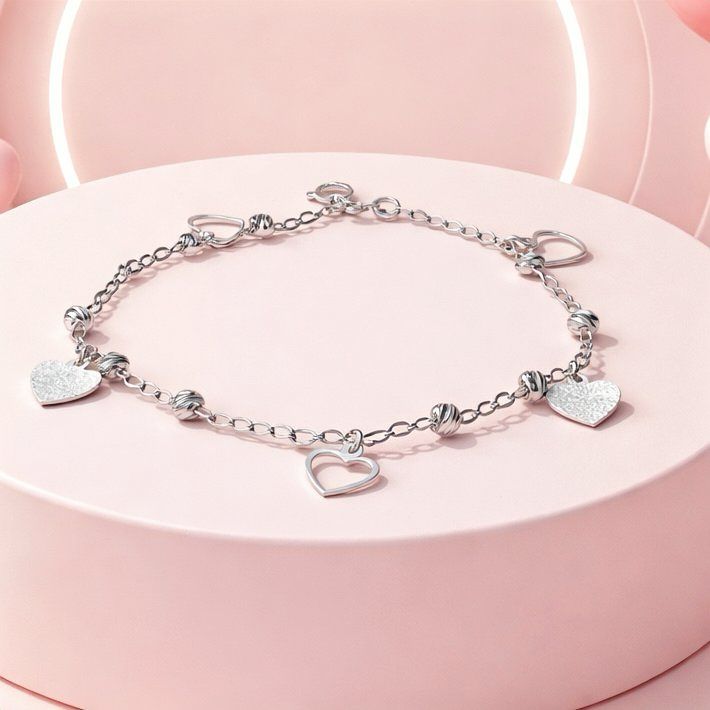 Pulsera Corazon Liso y silueta , mide 7.5" de largo, Plata 925 MX