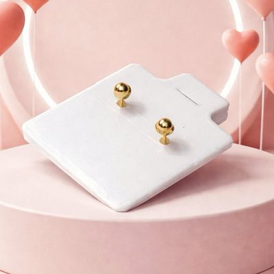 Broquel Ojito Oro 14K.