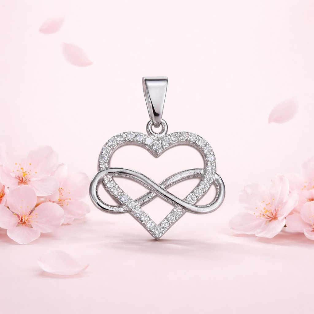 Dije Corazon Infinito Piedreria Blanca mide  3.5cm Plata Mexicana 925