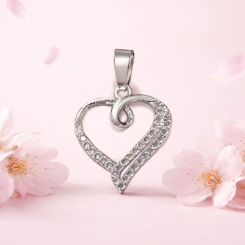 Dije Corazon Piedreria Blanca mide  3.5cm Plata Mexicana 925