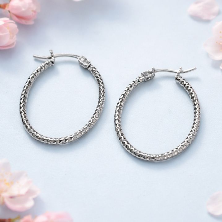 Arracada Fancy Faceada Ovalada mide 3cm Plata 925 MX