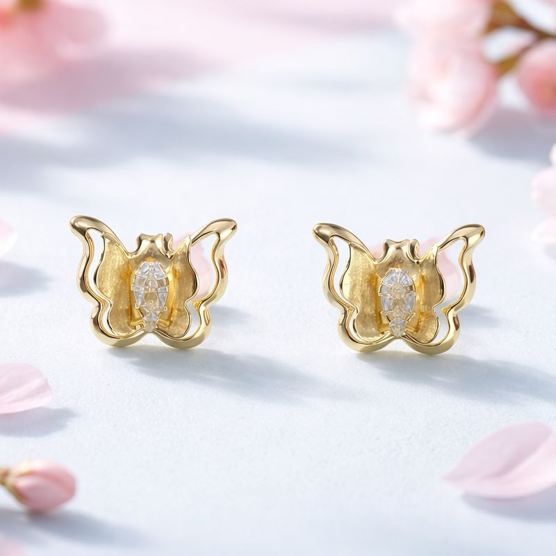 Broquel Mariposa 3D con Zirconia Blanca  Oro 10K bolita atrás
