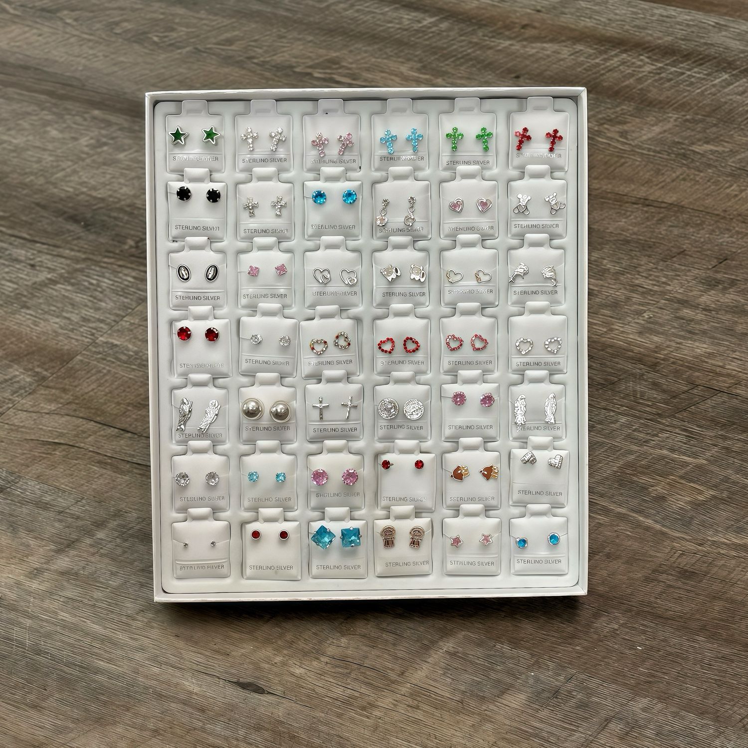 Caja con 42 pares de Broquel en Plata 925 