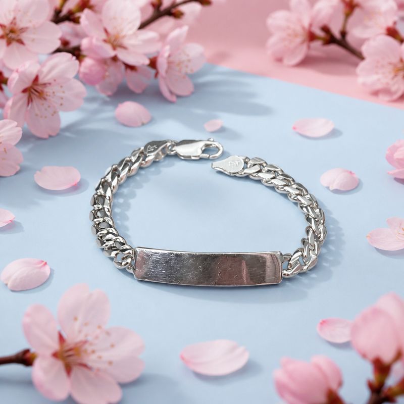 Pulsera Con Placa estilo cubano mide 8" de largo y 7mm de ancho. Solida.Plata mexicana 925