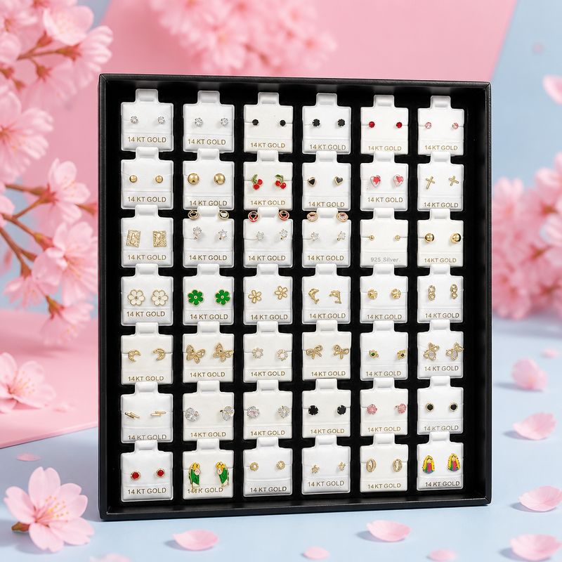 Caja con 42 pares Broquel Oro 14K