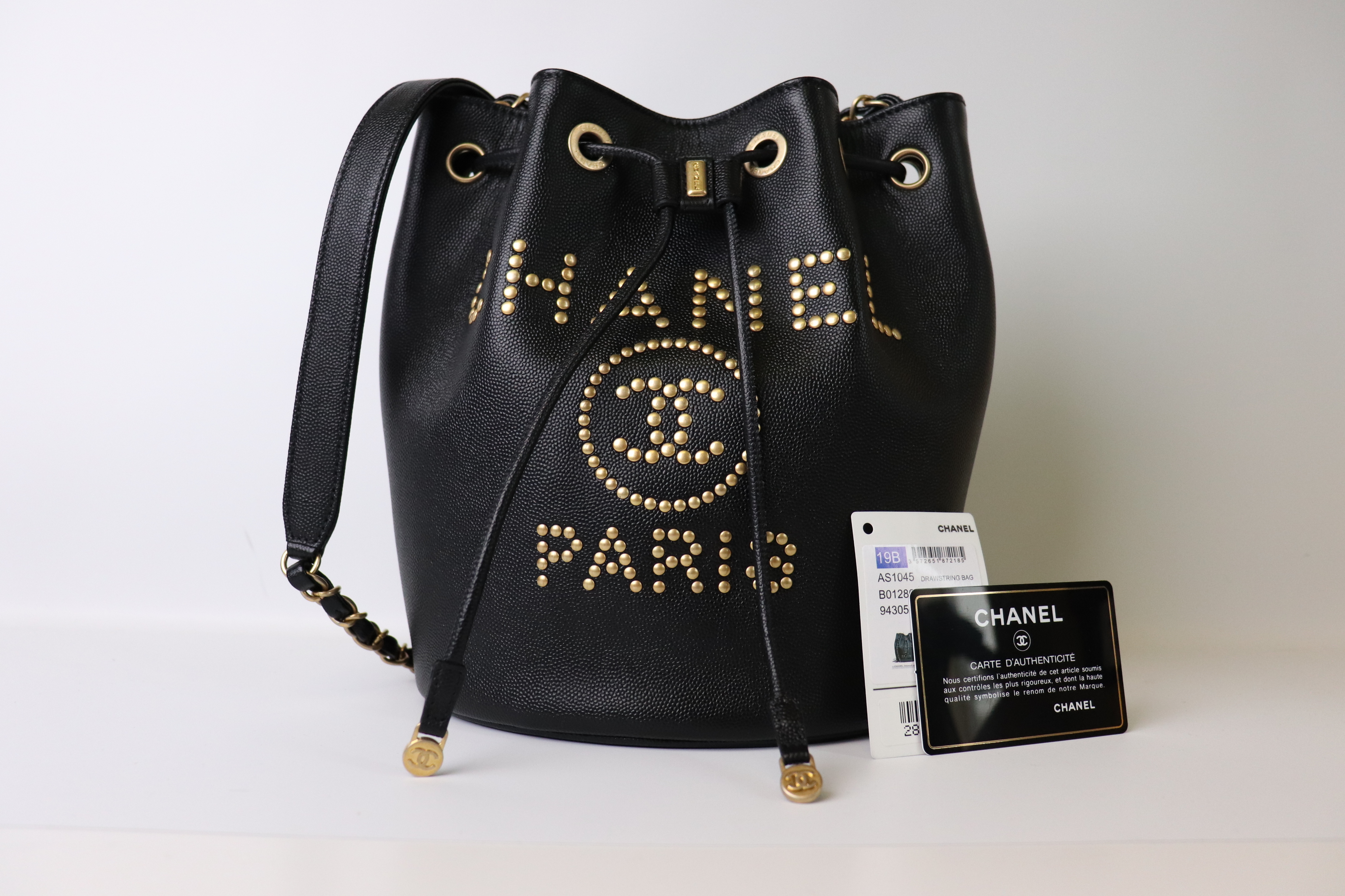 Chanel Bucket Drawstring Bag Black caviar with Gold Studs, New, Full Set