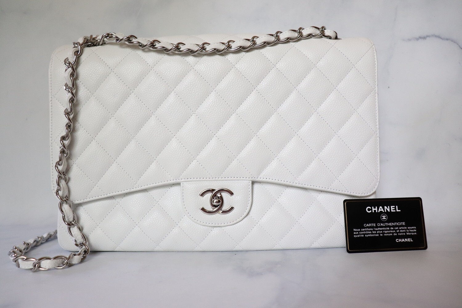 Chanel Classic Maxi Single Flap White Caviar Silver Hardware, Preowned in Black Dustbag