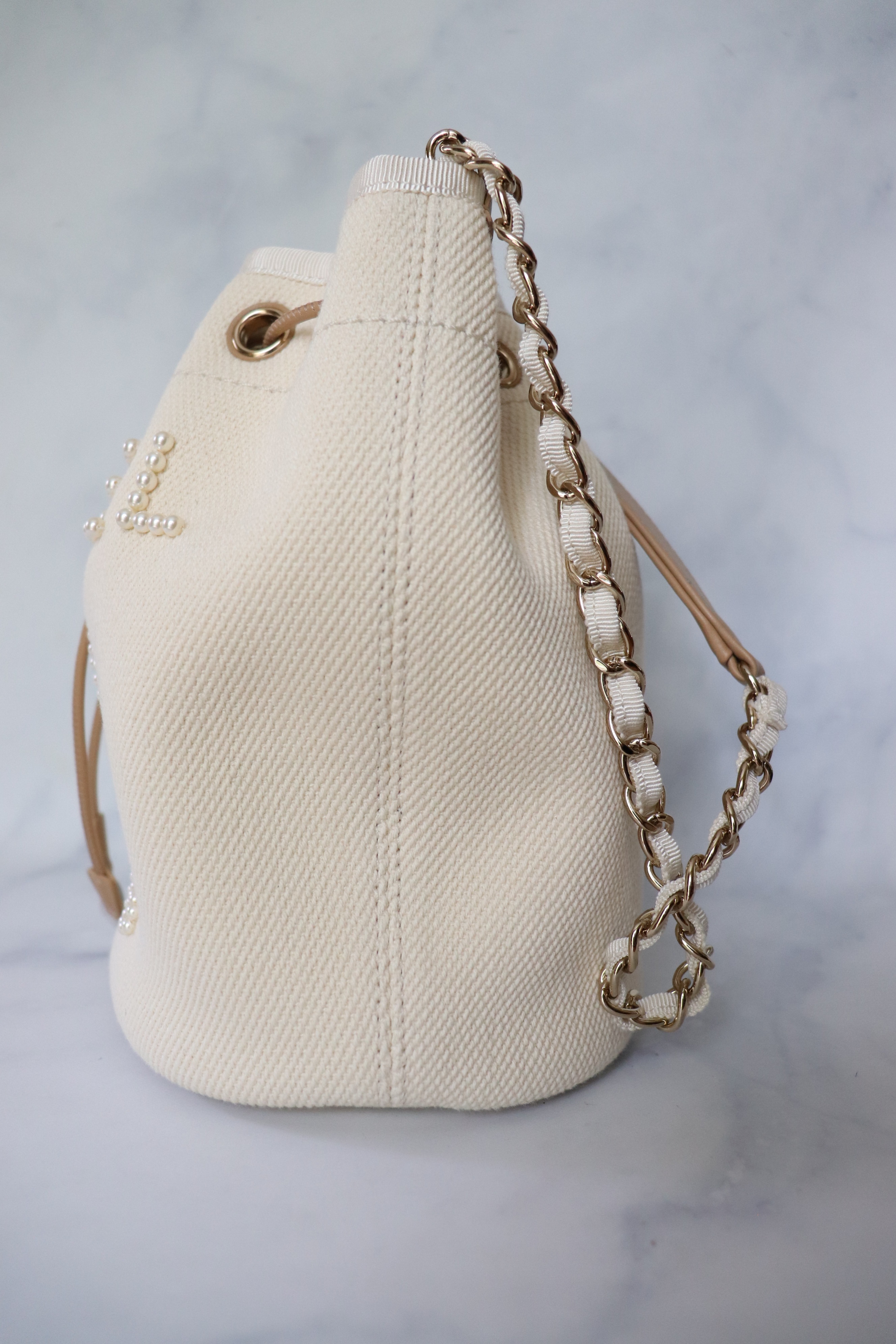 Chanel Caviar Quilted Rolled Up Bucket Drawstring Bag Beige Gold