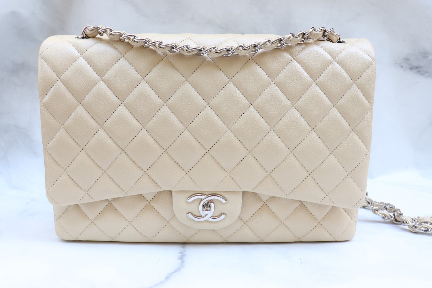 Chanel Classic Maxi Double Flap, Beige Caviar Leather, Silver Hardware, Preowned in Dustbag