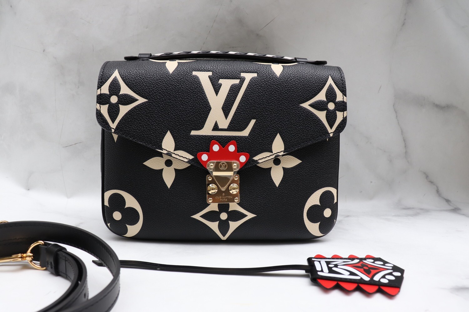 Louis Vuitton Pochette Metis Crafty Black Empreinte Leather, Gold Hardware, New in Dustbag