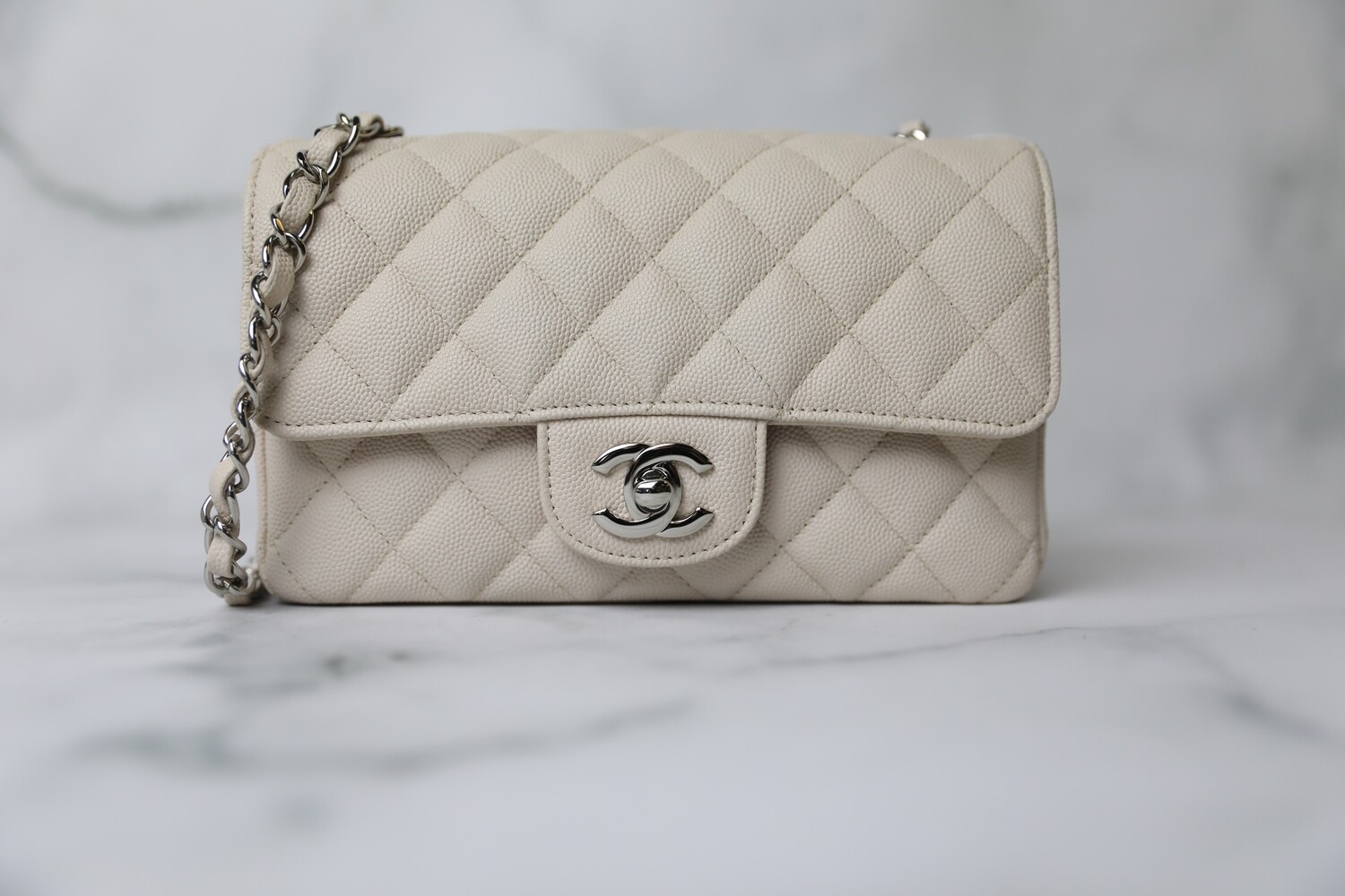 CHANEL Pearly Caviar Quilted Mini Rectangular Flap Beige 140026