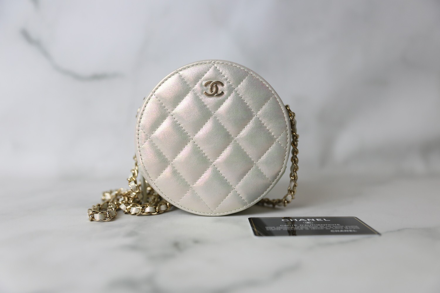 Chanel Round Crossbody, Pearl Iridescent lambskin with Gold Hardware. New  in Dustbag