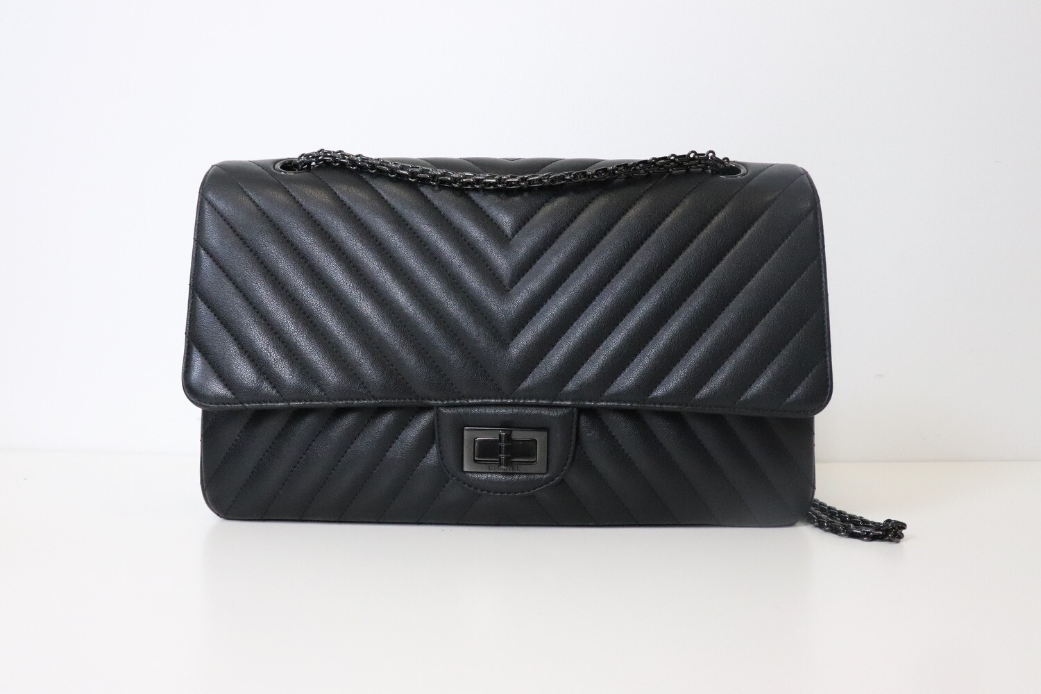 Chanel Reissue 227, So Black Chevron Sheepskin Leather, Black Iridescent Hardware, Preowned in Box