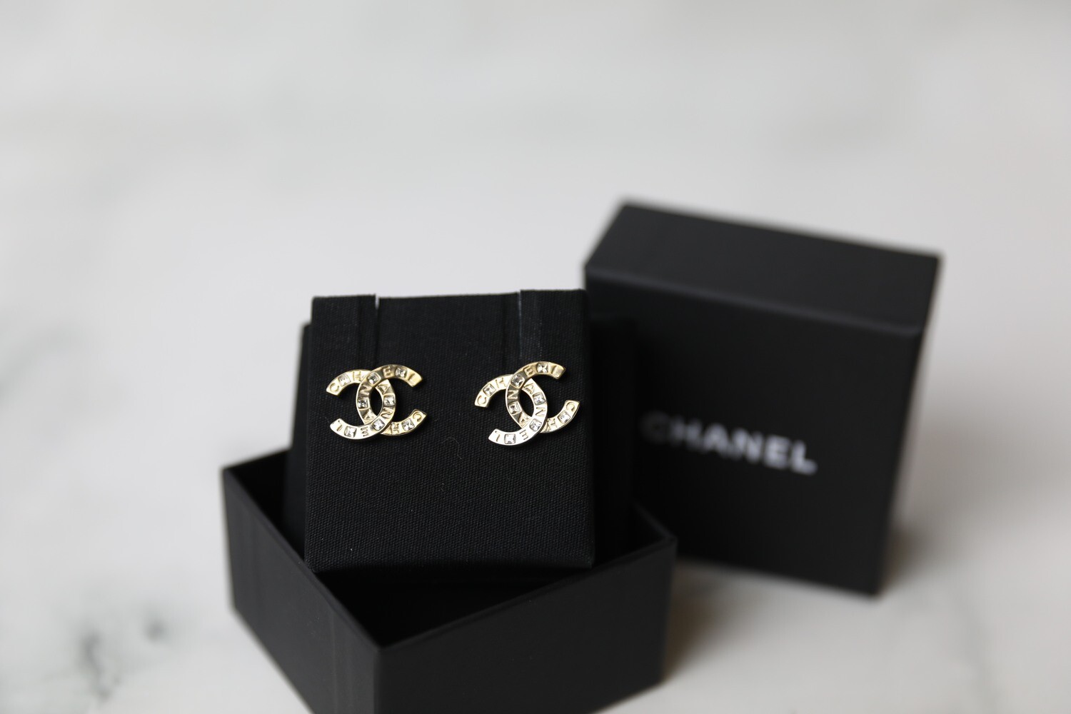 Chanel Earrings Studs Light Gold Embossed CC with Crystal, New in Box