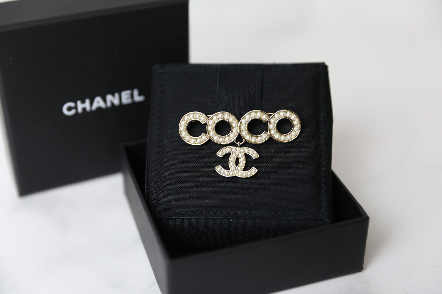 chanel clothing pin