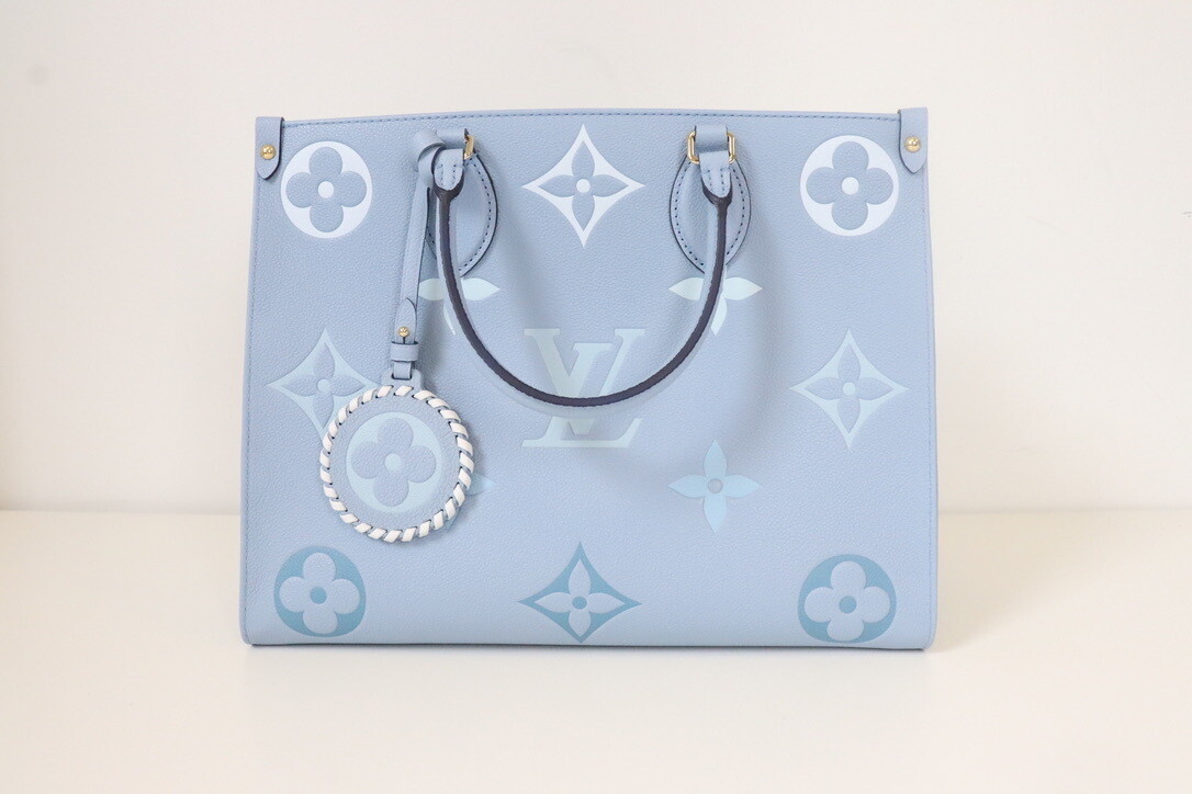 Louis Vuitton On the Go MM Blue Empreinte, New in Dustbag
