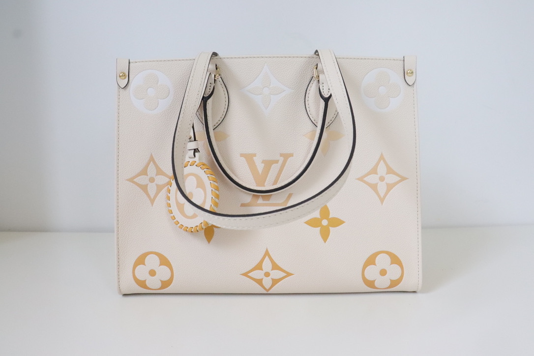Louis Vuitton Empreinte Embroidered Malletage Neverfull MM Cream, Preowned  in Dustbag WA001 - Julia Rose Boston