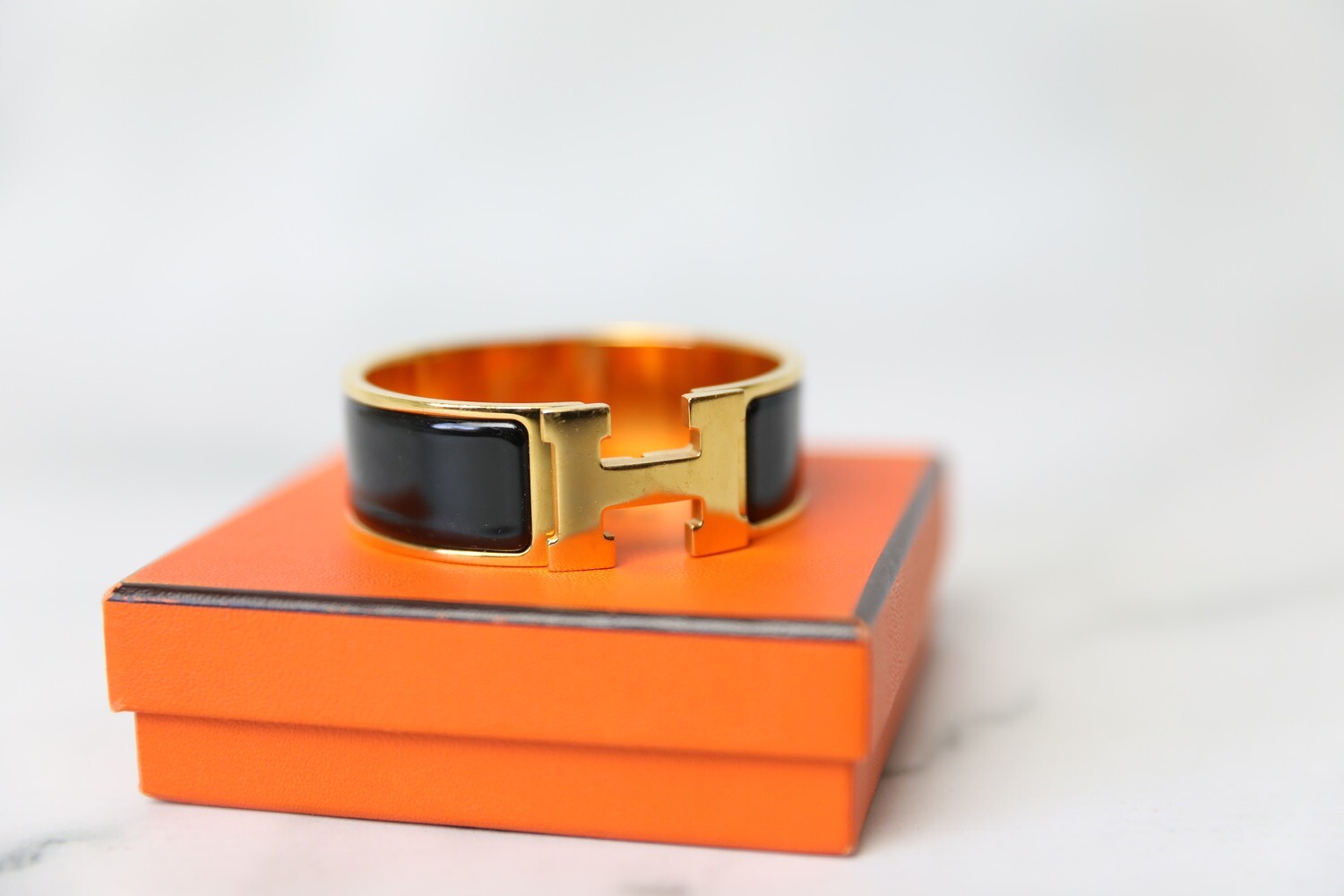 Hermes Clic Clac Bracelet, Black with Gold Hardware, Preowned in Box WA001