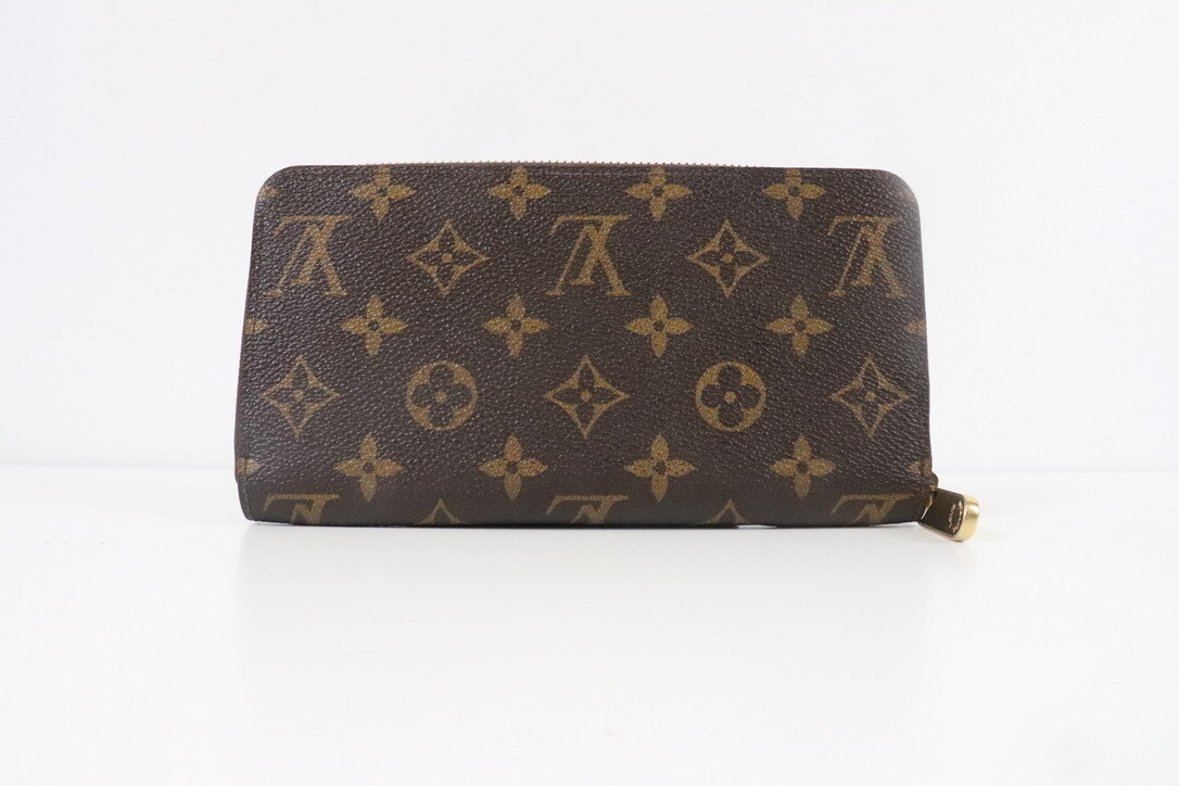 Louis Vuitton SLG Zippy Monogram, Preowned in Dustbag