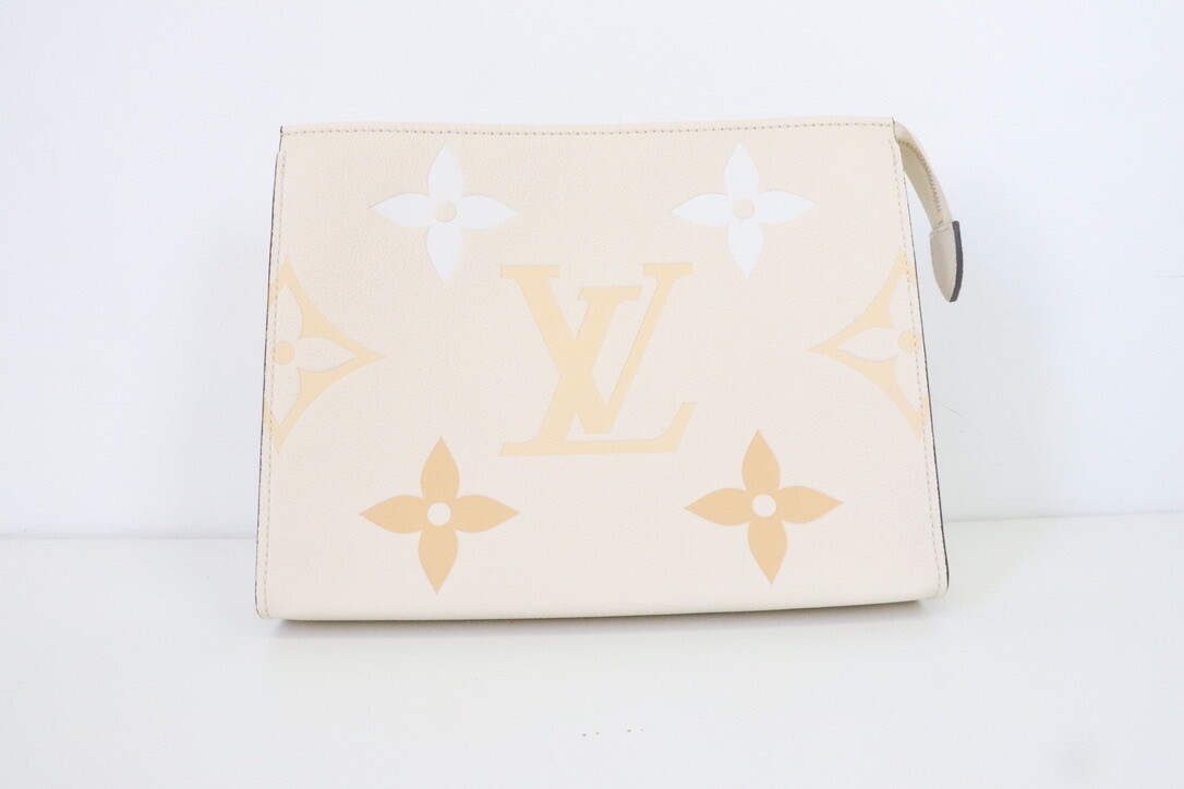 Louis Vuitton Toiletry 26 Saffron Empreinte Leather, New in Dustbag