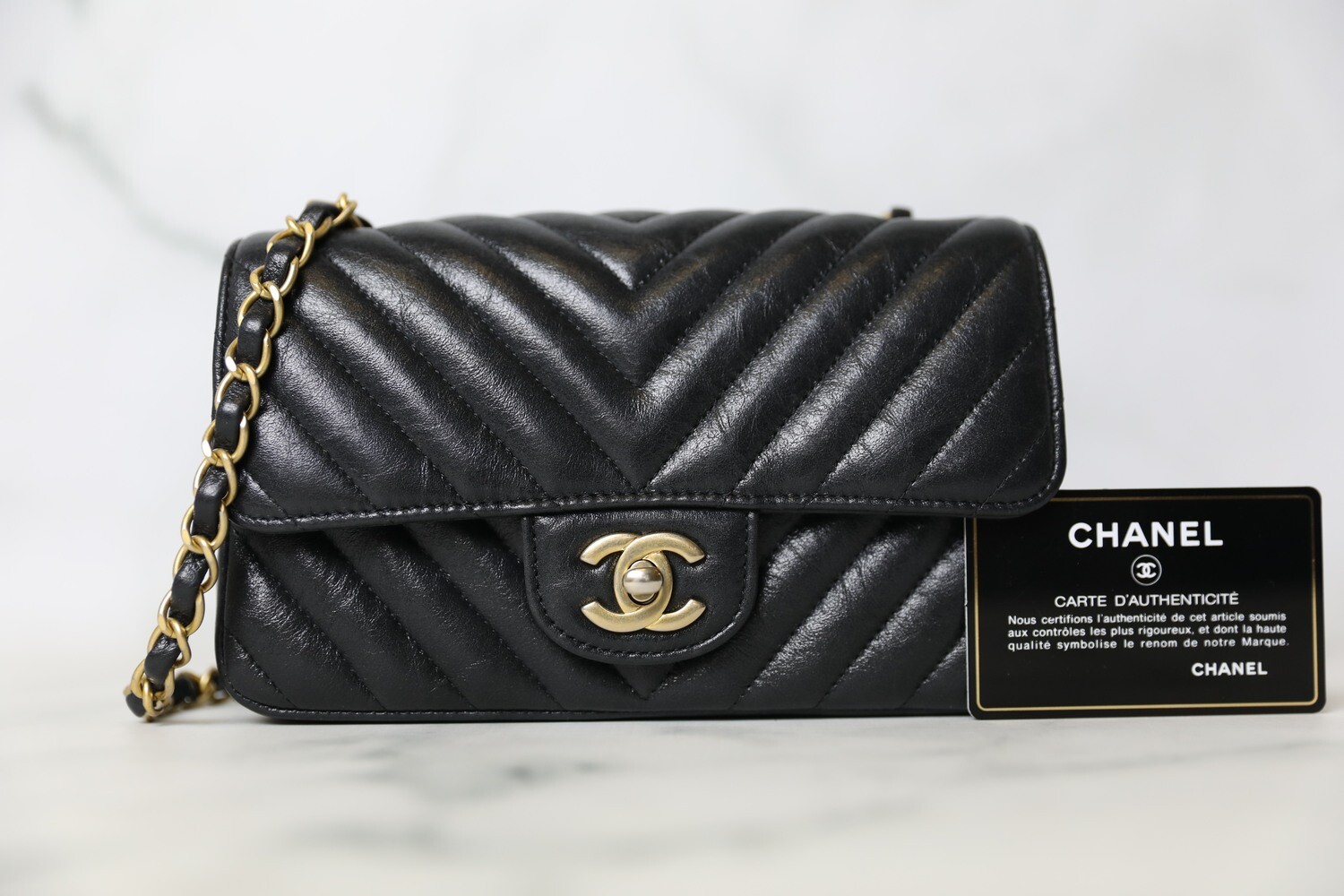 Chanel Classic Mini Rectangular, Black Shiny Chevron Calfskin with Aged  Gold Hardware, Preowned in Box WA001