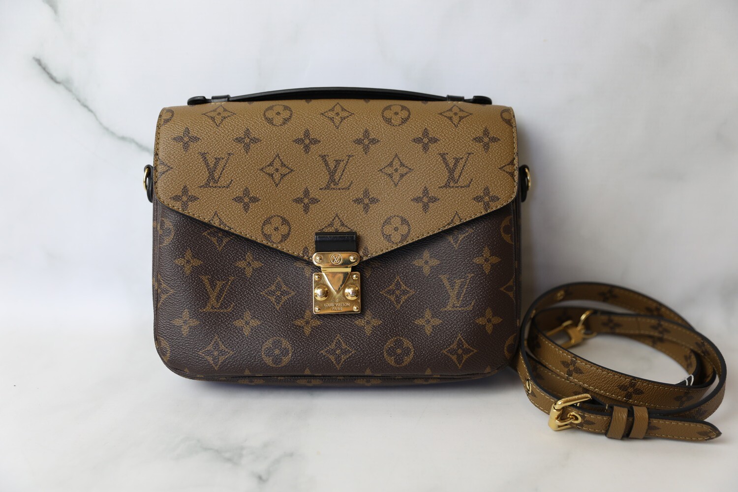 Louis Vuitton Pochette Metis, Reverse Monogram, Preowned in Dustbag WA001